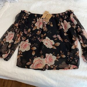 Black floral off the shoulder shirt